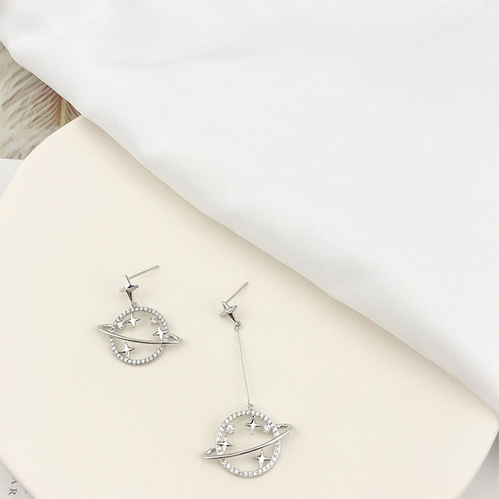 Asymmetric planet universe earrings